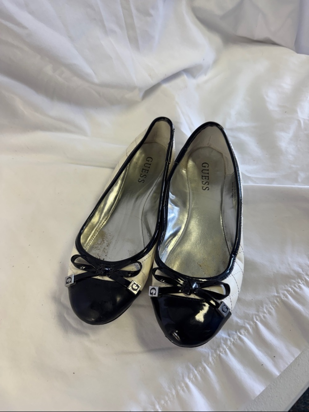 GUESS Black and White Quilted Patent Ballet Flats with Bow